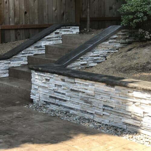 PATIO STAMPED AND COLORED AND STONE WALL